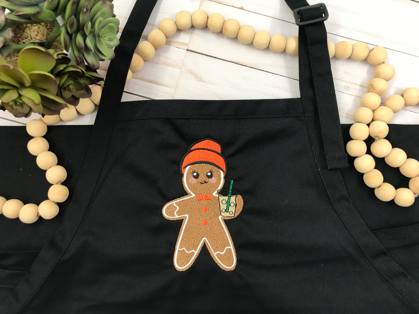 Gingerbread Holding Iced Coffee - Apron